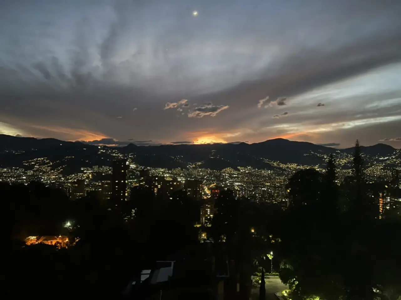 Medellín's lights across the valley after sunset, July 20, 2023