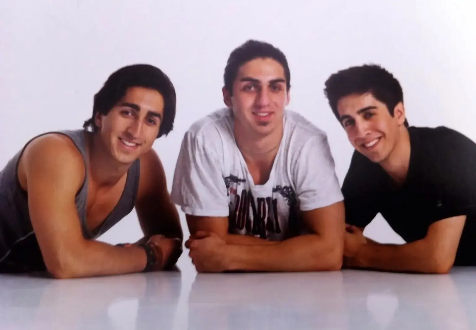 Navid Moazzez and his younger brothers