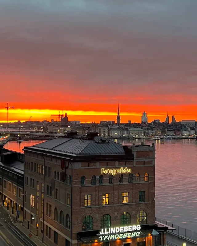 My photo of Stockholm at sunset, over Fotografiska, cut to X's portrait post, 4:5 (1,440 × 1,800)