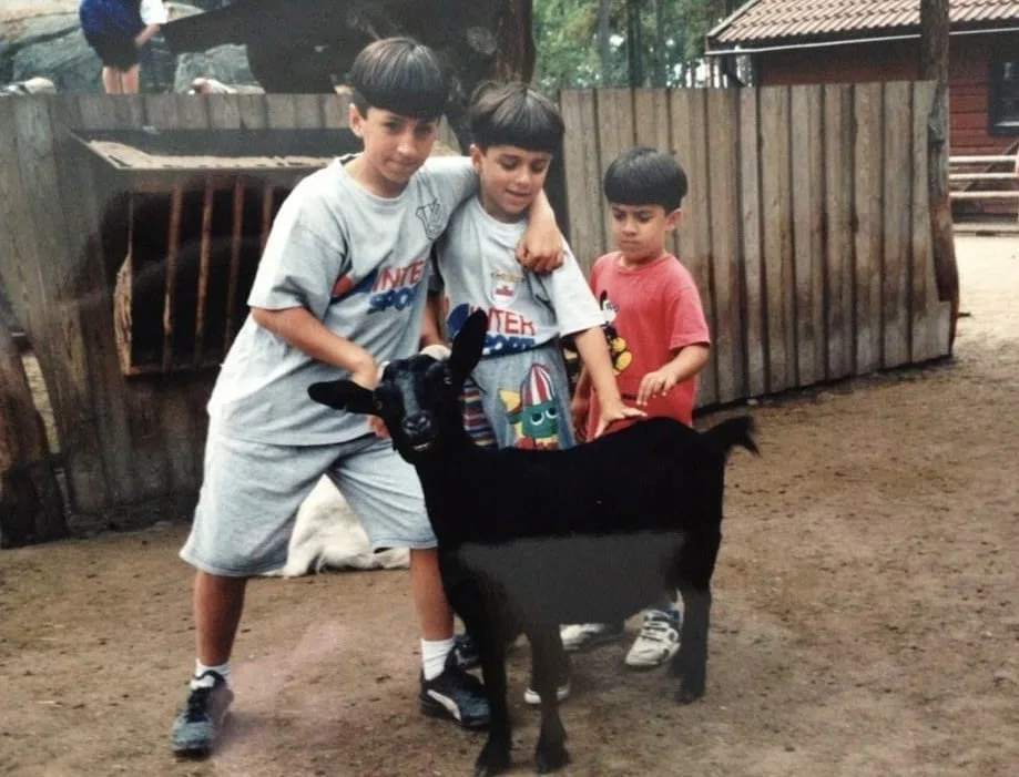 Navid Moazzez and his younger brothers as kids