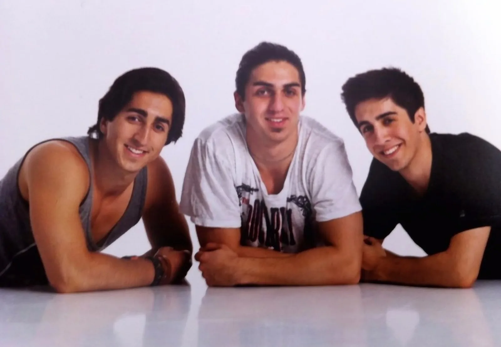 Navid Moazzez and his younger brothers