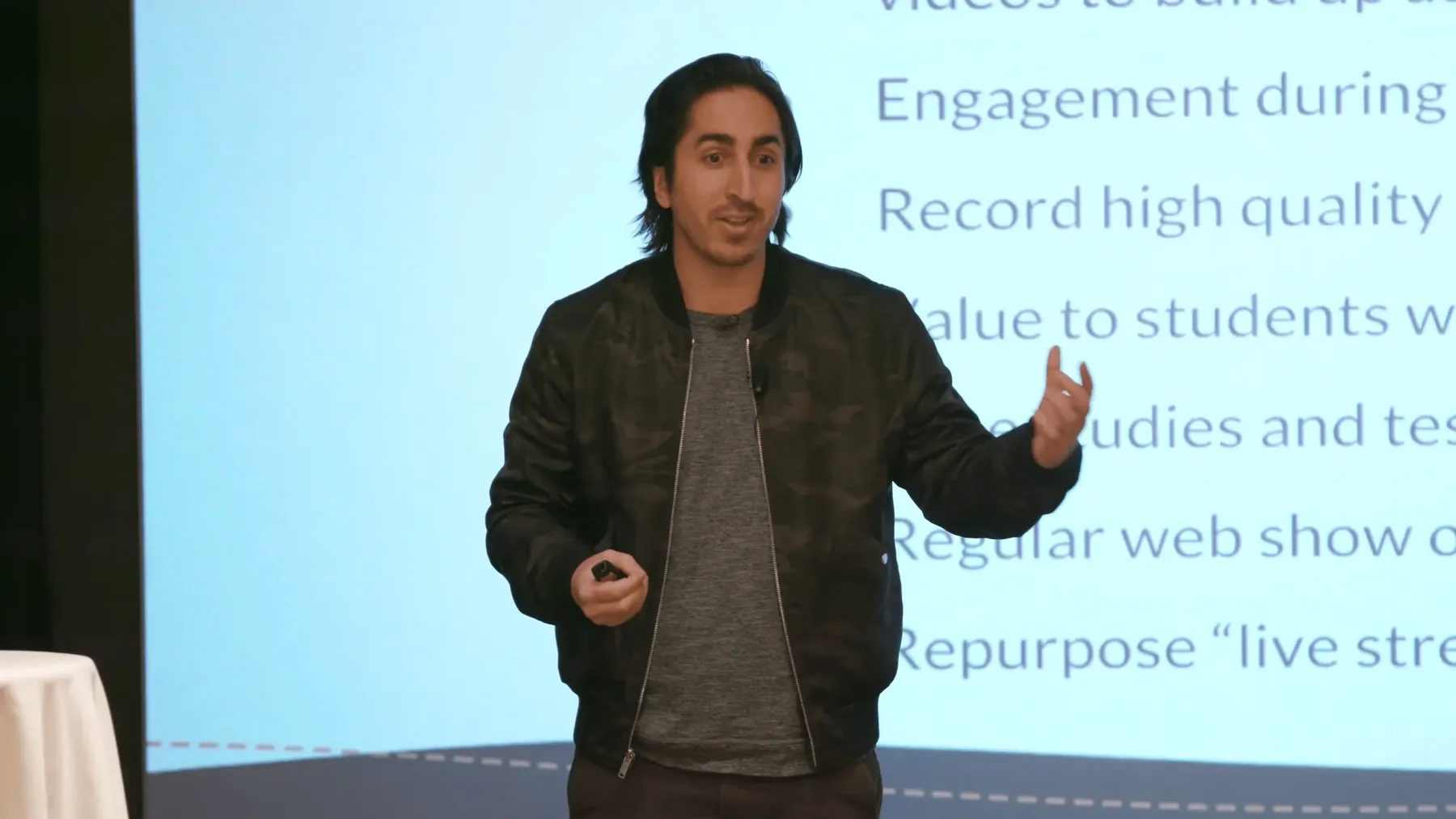 Navid Moazzez speaking at Ryan Levesque's mastermind