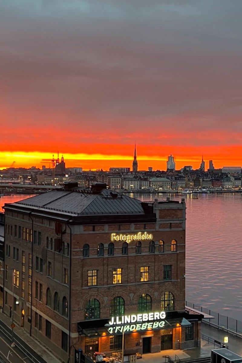 My photo of Stockholm at sunset, over Fotografiska, cut to Pinterest's standard pin, 2:3 (1,000 × 1,500)