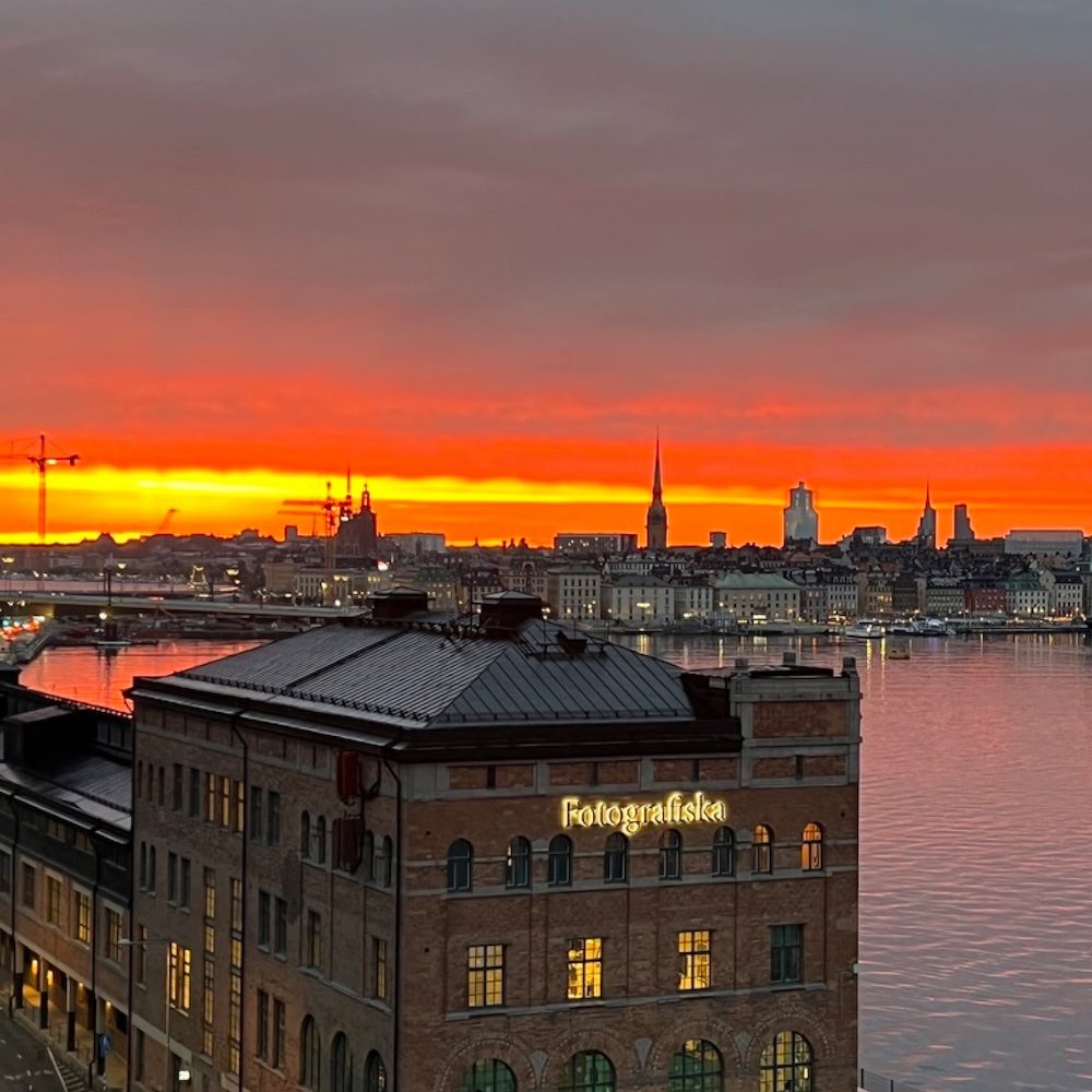 My photo of Stockholm at sunset, over Fotografiska, cut to Pinterest's square pin (1,000 × 1,000)