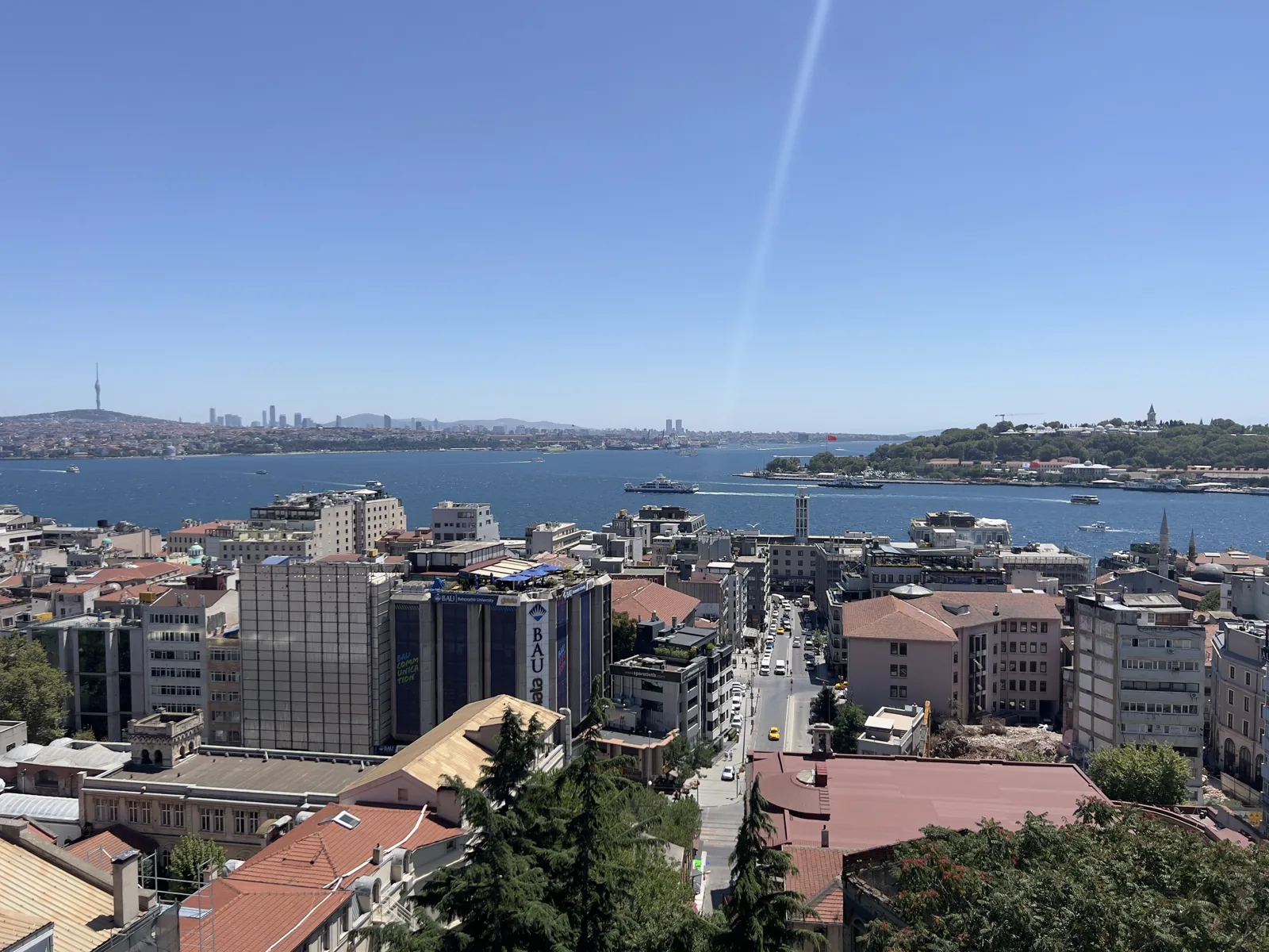 The Bosphorus over the rooftops of Beyoğlu, July 28, 2022