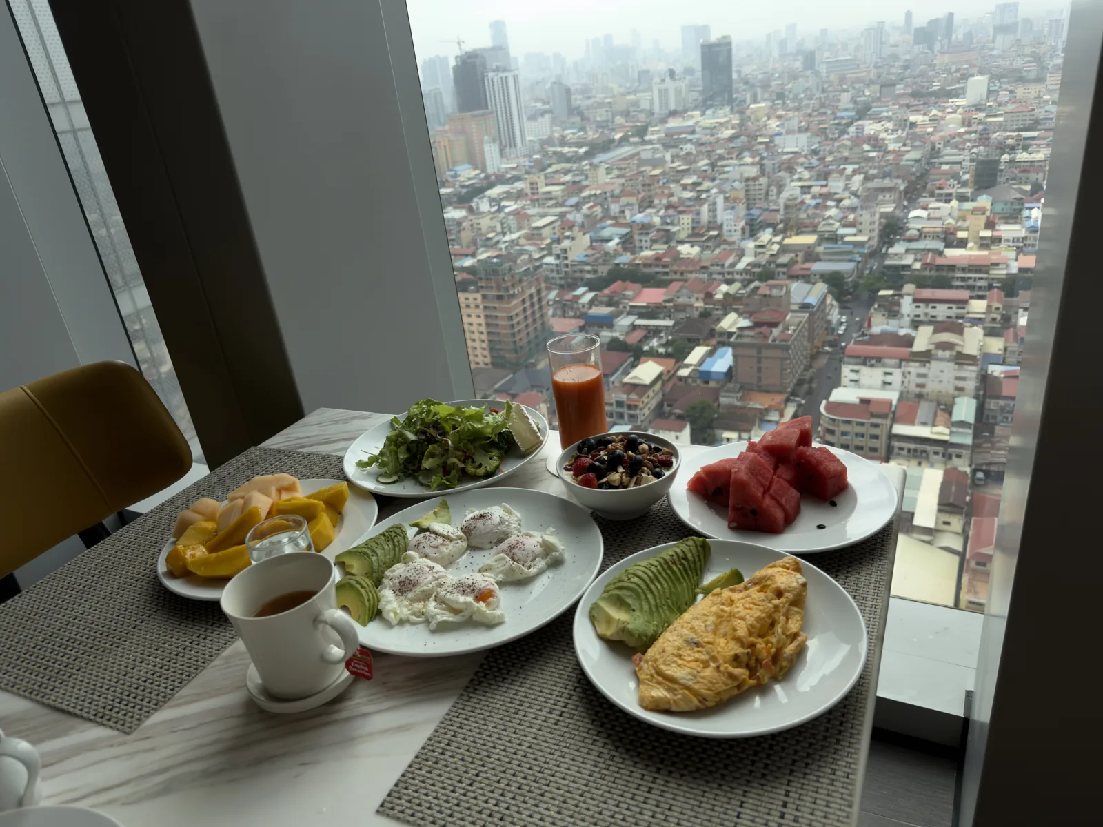 Breakfast by the window over Phnom Penh, January 18, 2026