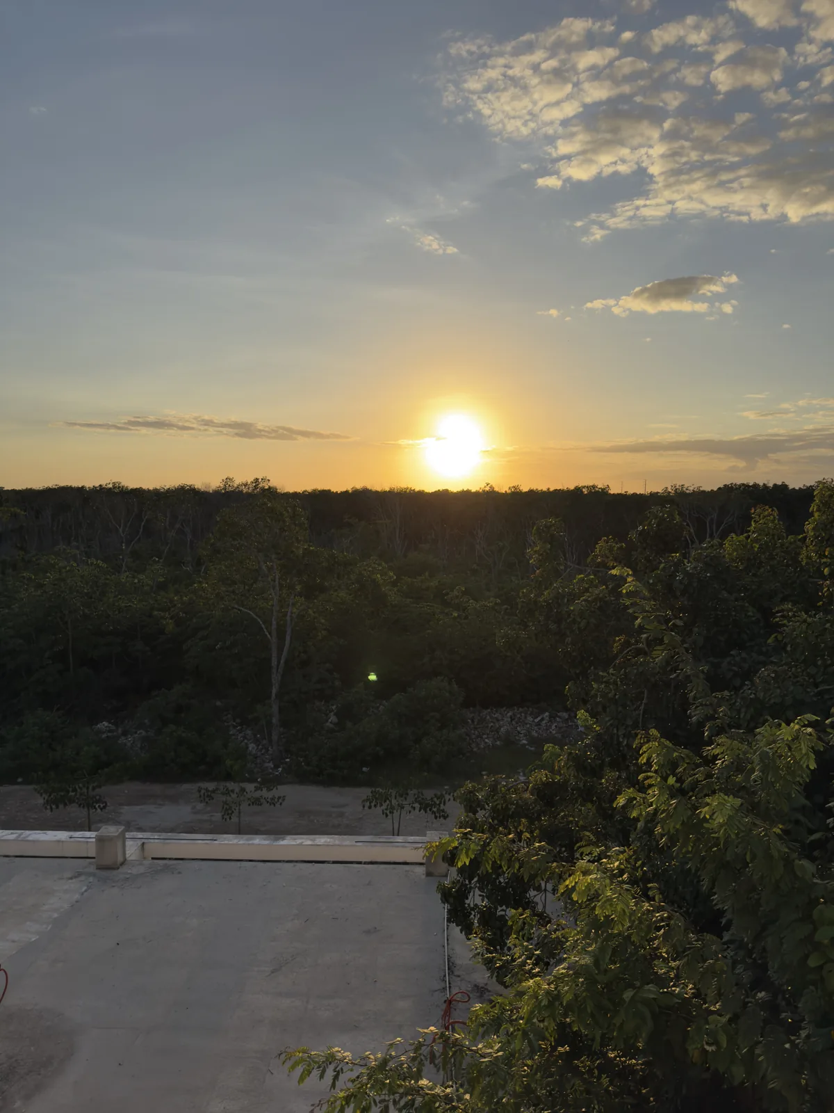 Sunset over the jungle in Tulum, October 31, 2025