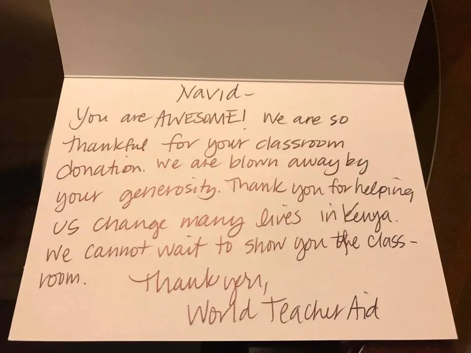 A handwritten thank-you card from World Teacher Aid for Navid's classroom donation in Kenya